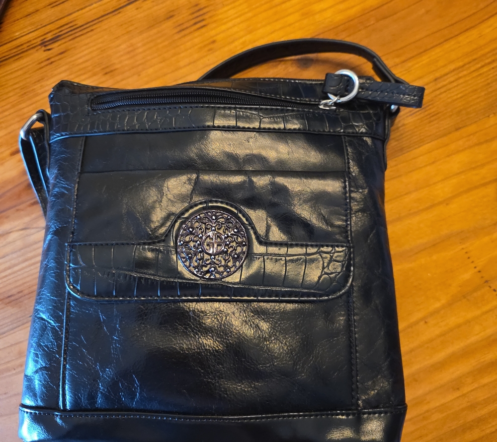 Black Crossbody Bag with Decorative Medallion
